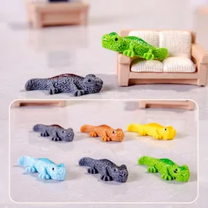 Detailed close-up of colorful resin lizard figurines showing lifelike skin texture and scales