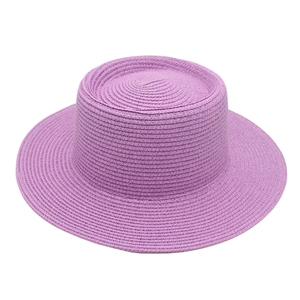 Close-up of lavender purple boater straw hat with detailed weave and flat top brim