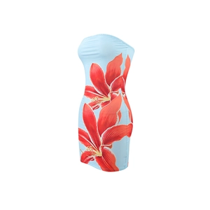 Detailed view of the red floral print on light blue strapless bodycon mini dress