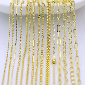 Close-up of assorted 18K gold plated copper jewelry chains with various design patterns
