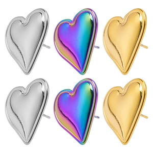 Three pairs of 3D heart stud earrings in polished silver, gold, and iridescent finishes