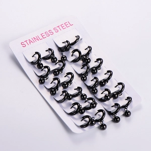 Set of black stainless steel hoop earrings with bead details on white display card