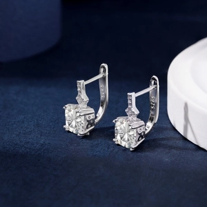 Close-up of S925 sterling silver hoop earrings with square-cut cubic zirconia crystals