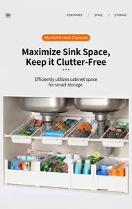 Adjustable white plastic sink organizer with retractable hooks for cabinet storage space