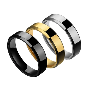 Polished titanium steel rings set in black, gold, and silver finishes for couples