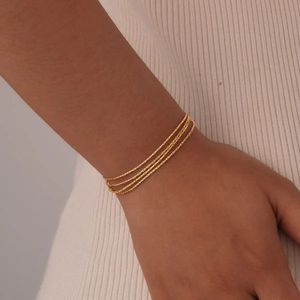 Minimalist gold hammer-textured four-layer stainless steel thin bracelet for women