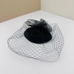 French vintage black fascinator hat with mesh veil and bow for formal evening events