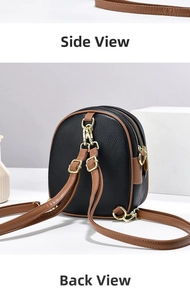 Detail showing the lychee texture leather, gold zippers, and back side of the mini backpack