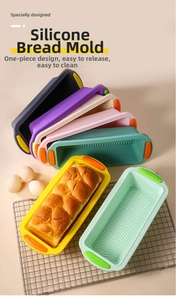 Detail of colorful silicone toast molds with non-stick ripple base and golden bread