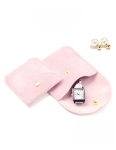 Pink velvet jewelry pouches with gold snap button closures for rings and watches