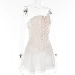 Detailed front view of white strapless lace-up corset vest and matching A-line mini skirt