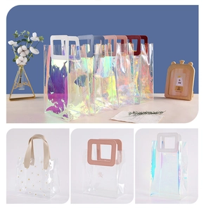 Detail of holographic laser finish and durable faux leather handles on PVC gift bags