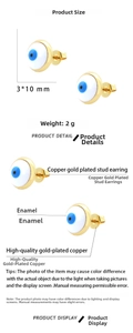 Detail view of 3x10mm gold plated evil eye stud earrings with blue enamel finish