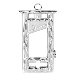 Macro shot of silver stainless steel guillotine pendant with detailed mechanical hollow design