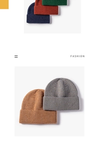 Close-up of ribbed knit beanies in dark green, navy, and earth tones with wide fold-up cuffs