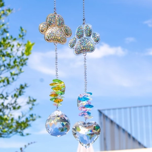 Dog paw crystal suncatcher with rainbow prisms for pet memorial window hanging decor