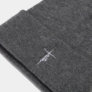 Dark grey knitted beanie featuring white Faith embroidery with cross element design