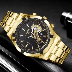 Detail of ORUSS chronograph watch with black dial, gold markers, and stainless steel band