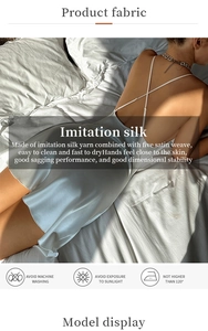 Detail of cross-strap back and silk-like fabric texture on stylish nightgown