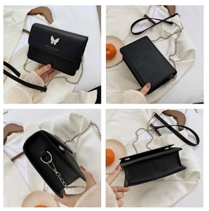 Detail view of black square chain bag with butterfly logo from multiple angles