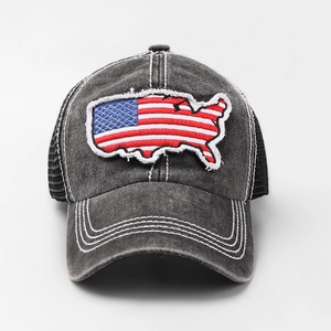 Detail of grey washed denim baseball cap with USA map embroidery and mesh back