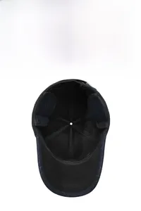 Detailed interior view of winter baseball cap showing foldable ear flaps and warm lining