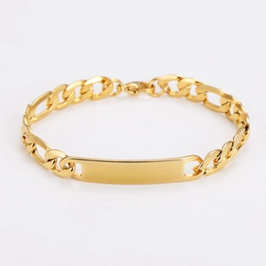 Detailed view of golden Figaro chain bracelet featuring a polished ID plate for men