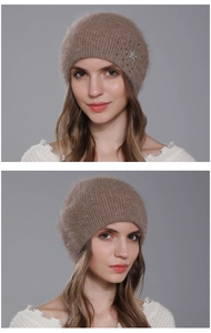 Close-up of winter angora knit hat with sparkling rhinestone leaf detail for women