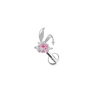 Detailed view of silver rabbit piercing jewelry featuring pink heart-shaped stone and crystals