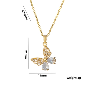 Minimalist gold butterfly necklace with zircon stones, measuring 21mm x 11mm in size
