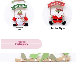 Detailed view of handmade wooden Christmas welcome signs with snowman and Santa hanging figures