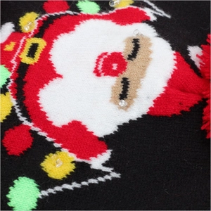 Macro detail of knitted Christmas Santa pattern with integrated festive LED lights