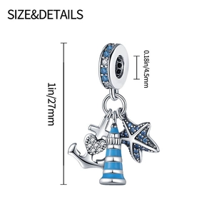 Detail of silver nautical charm with anchor, lighthouse and star with blue zircon stones