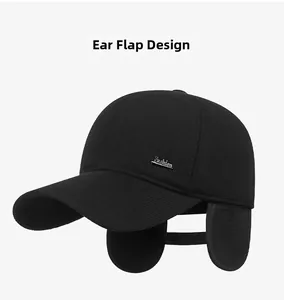Detail view of winter baseball cap with ear flaps down and metal Fashion logo