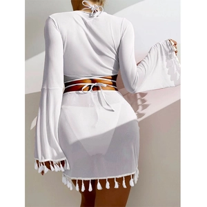 Sexy white two-piece beach cover-up set with long sleeves and tassel fringe mini skirt