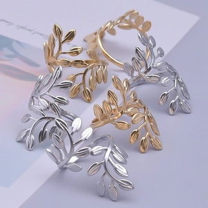 Elegant gold and silver olive leaf rings crafted from polished stainless steel