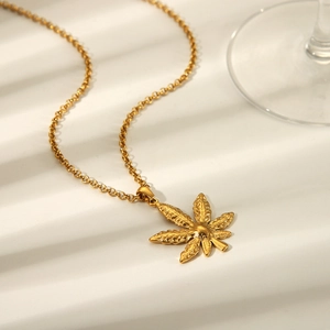 Elegant gold stainless steel necklace with a detailed cannabis leaf pendant design