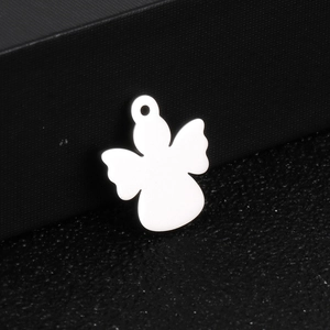 Polished silver angel pendant in minimalist geometric style on a dark textured base