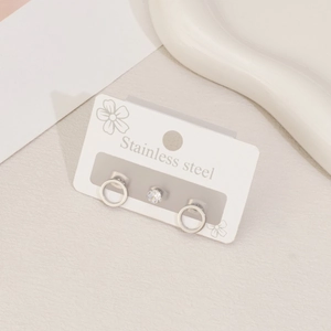 Detail of three-piece stainless steel earring set with heart, round, and star shapes