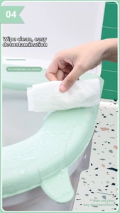 Waterproof EVA toilet seat cover with handle featuring anti-slip diamond texture in green
