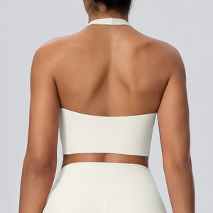 Vista posteriore del reggiseno sportivo color crema con scollo all'americana