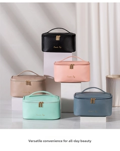 Detail view of large capacity cosmetic bags in five colors with cross-grain leather and gold zippers