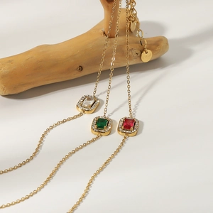 18K gold plated titanium steel bracelet with geometric zircon pendants in three colors