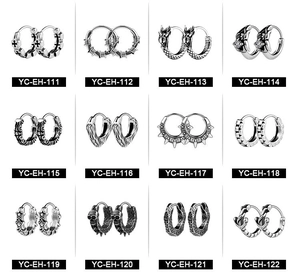 Collection of 12 vintage gothic punk earrings with skull, cross and star designs in silver