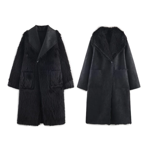 Women's reversible black faux fur and suede long coat featuring a versatile stylish design