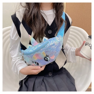 Detail of blue sequin unicorn fanny pack with colorful ears and horn for girls