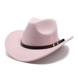 Detail of pink felt cowboy hat with dark brown leather band and gold metal studs
