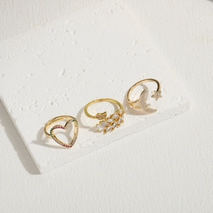 Three-piece gold-plated ring set with star, moon, heart designs and colorful zircons