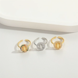 Three minimalist bow-knot open rings with religious motifs and sparkling cubic zirconia