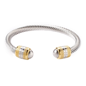Detail showing two-tone cable style stainless steel open cuff with grey stone inlay